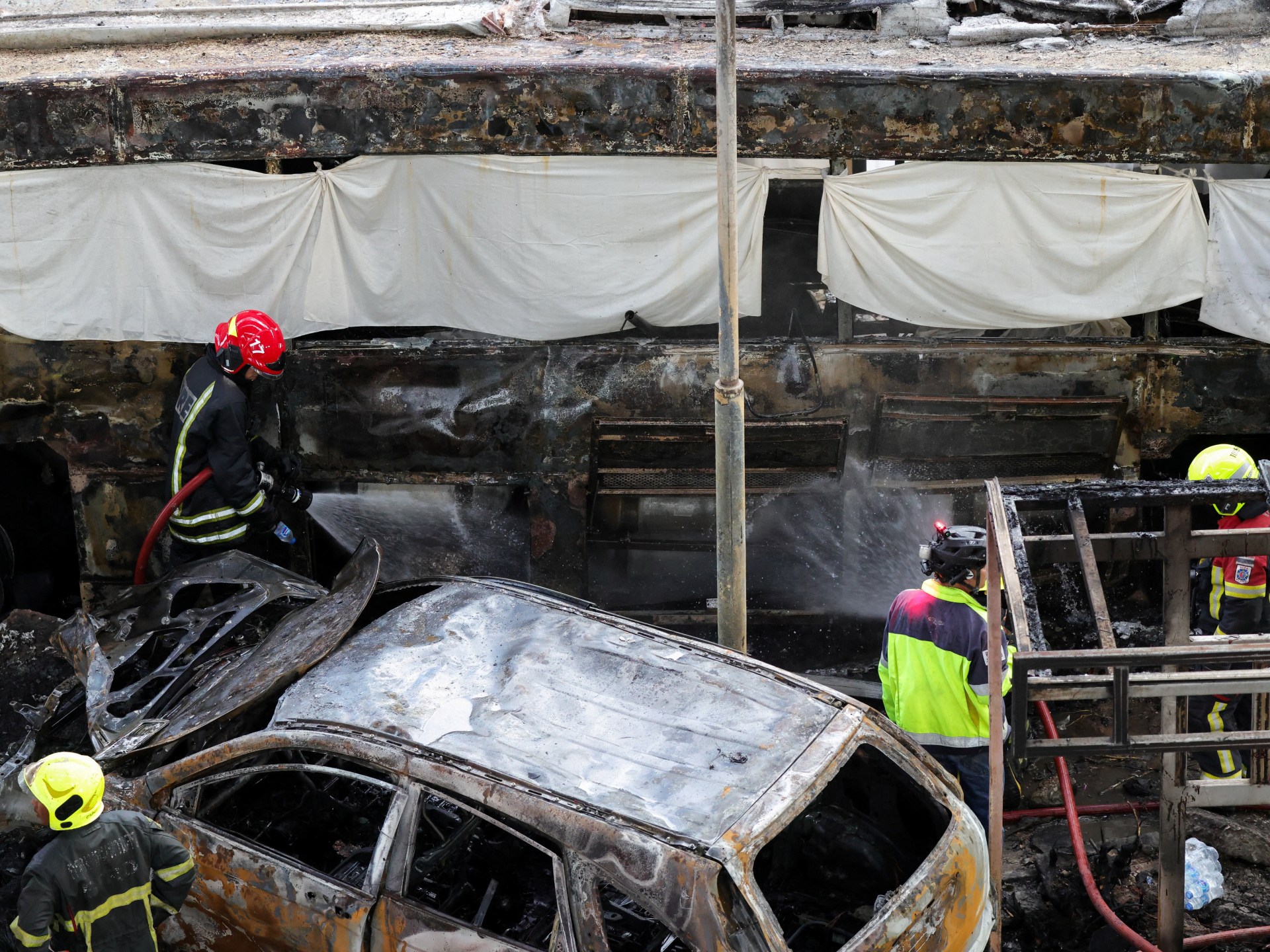 At least eight killed, 25 injured as train hits bus in Bangkok | News