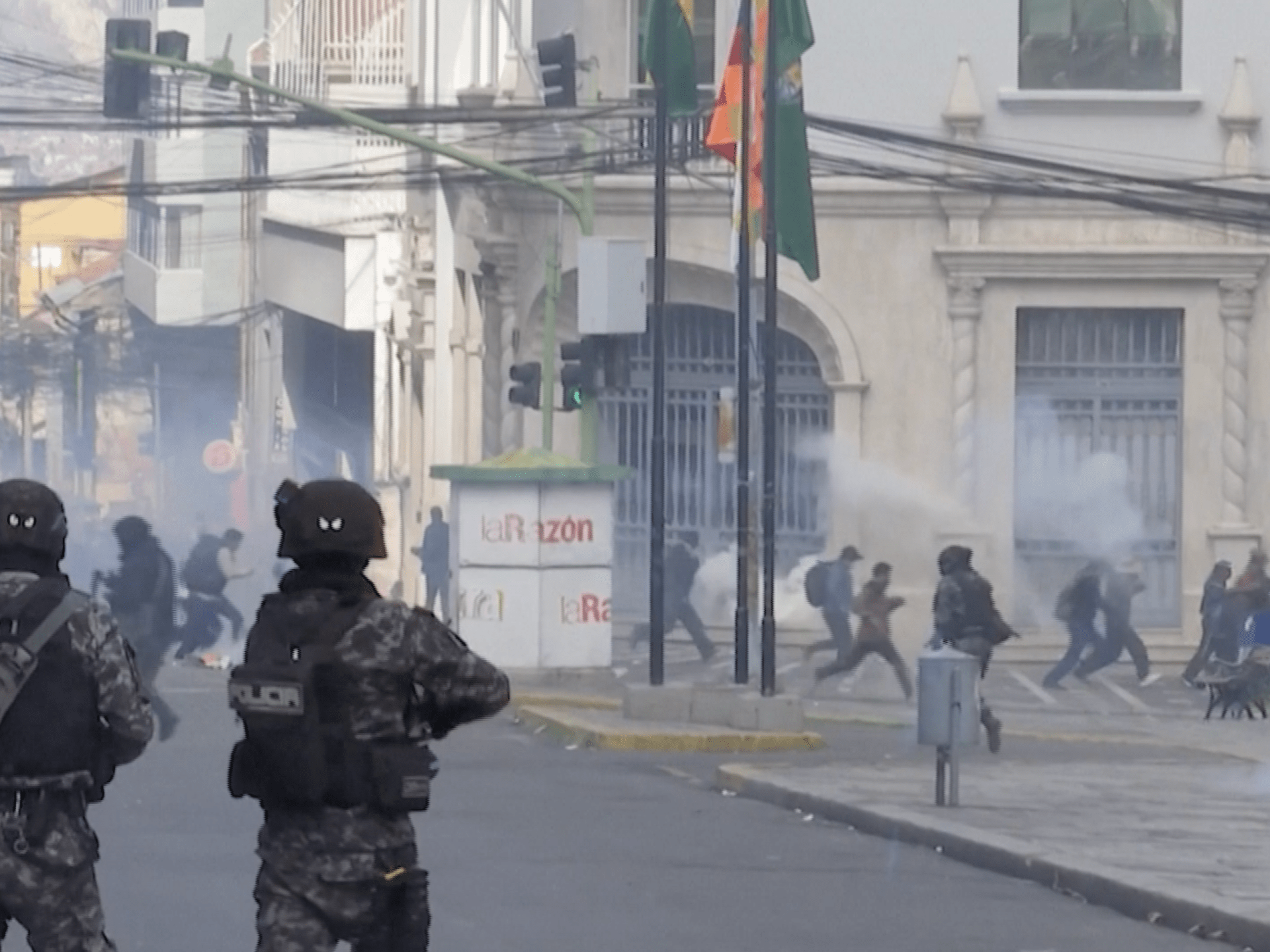 Bolivian miners clash with police demanding president resign | Protests